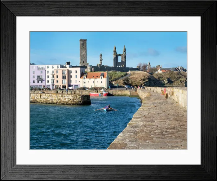 Framed Print : Rowing boat entering St Andrews Harbour on a sunny spring morning St Andrews Fife Scotland Framed Print : Rowing boat entering St Andrews Harbour on a sunny spring morning St Andrews Fife Scotland