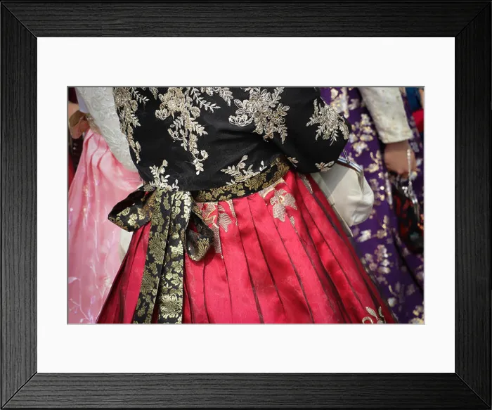 Framed Print : Close up of a bright red pleated chima or wrap-around skirt Framed Print : Close up of a bright red pleated chima or wrap-around skirt