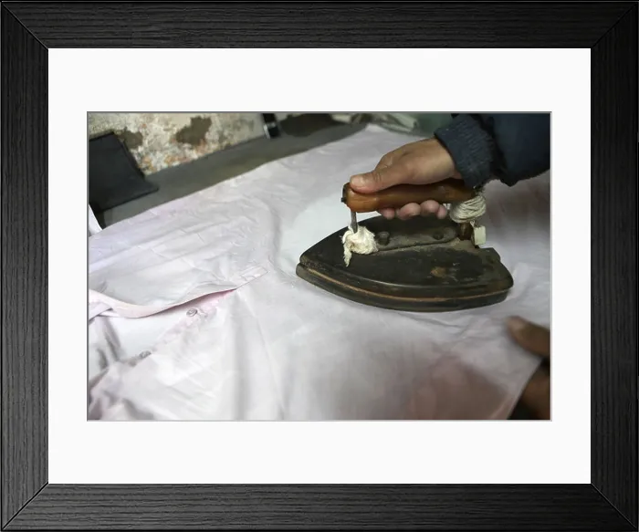 Framed Print : ironing clothes in Pakistan Framed Print : ironing clothes in Pakistan