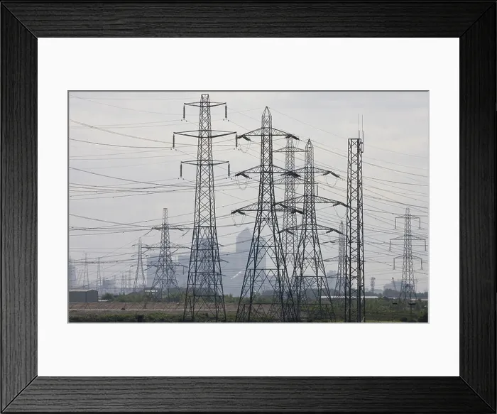 Framed Print : Electricity Pylons part of the National Grid stretch out across Essex U K Framed Print : Electricity Pylons part of the National Grid stretch out across Essex U K