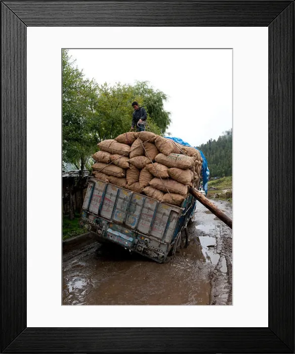 Framed Print : Overloaded truck stuck on wet dirt road, Phobjikha Valley, Wangdue Phodrang District, Bhutan Framed Print : Overloaded truck stuck on wet dirt road, Phobjikha Valley, Wangdue Phodrang District, Bhutan