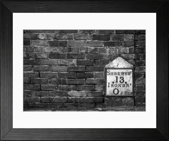 Framed Print : Image of an old cast iron mileage marker in Ironbridge
