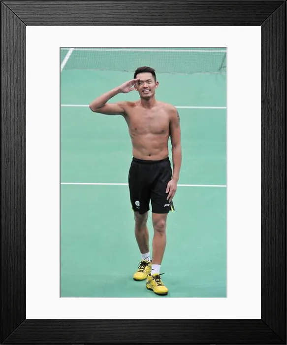 Framed Print : Chinese badminton player Lin Dan salutes after he wins the championship for the Mens Singles tournament of the 2013 BWF Framed Print : Chinese badminton player Lin Dan salutes after he wins the championship for the Mens Singles tournament of the 2013 BWF