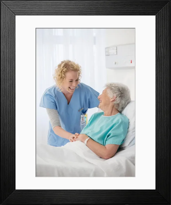 Framed Print : Nurse and senior patient talking in hospital room Framed Print : Nurse and senior patient talking in hospital room