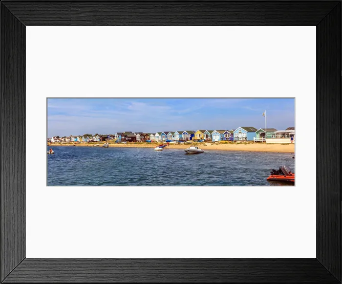 Framed Print : View of the beach huts on Mudeford Sandbank, Christchurch Dorset. England UK taken from the Mudeford Ferry