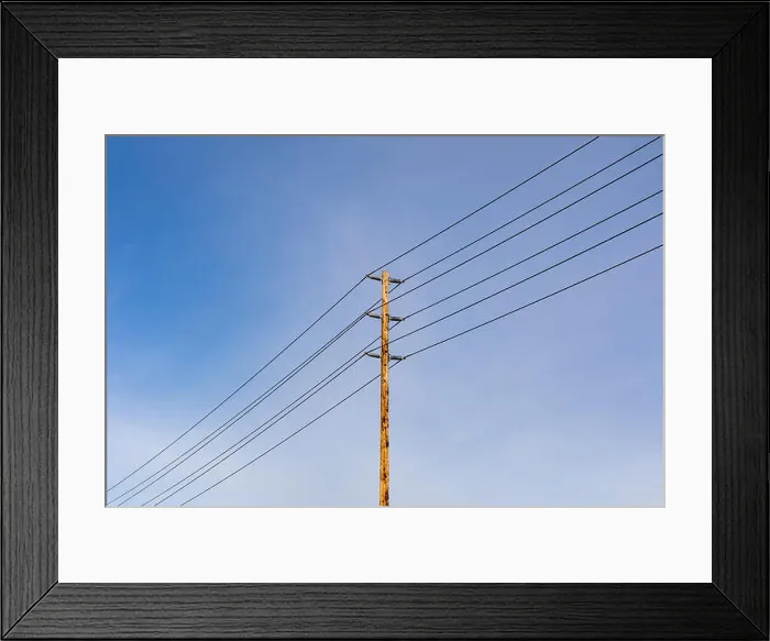 Framed Print : Utility pole and wires against sky Framed Print : Utility pole and wires against sky