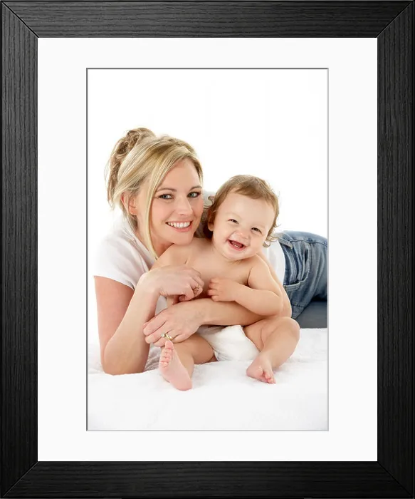 Framed Print : Studio Portrait Of Mother With Young Baby Boy Framed Print : Studio Portrait Of Mother With Young Baby Boy