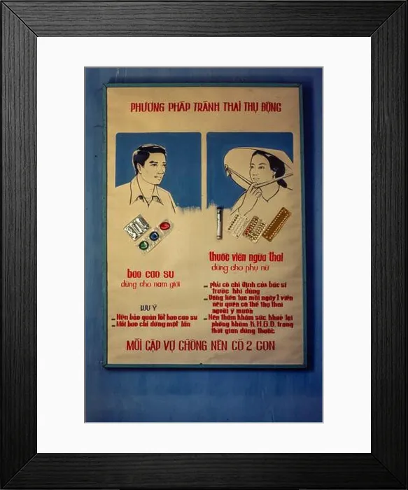 Framed Print : A poster promoting contraception at the Birth Control Clinic, Ho Chi Minh City, Vietnam, June 1980 Framed Print : A poster promoting contraception at the Birth Control Clinic, Ho Chi Minh City, Vietnam, June 1980