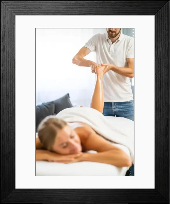 Framed Print : Professional masseur doing therapeutic massage Framed Print : Professional masseur doing therapeutic massage