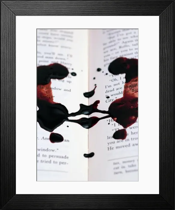 Framed Print : blood (red ink) on book pages Framed Print : blood (red ink) on book pages