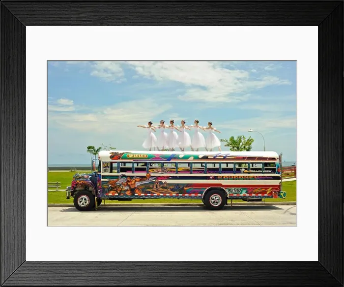 Framed Print : Six ballerinas dance and balance on top of a Diablo Rojo bus on La Cinta Costera, Panama's coastal highway Framed Print : Six ballerinas dance and balance on top of a Diablo Rojo bus on La Cinta Costera, Panama's coastal highway
