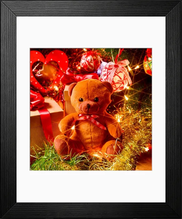 Framed Print : closeup of a brown teddy bear and some gifts under a christmas tree ornamented with lights, balls and tinsel Framed Print : closeup of a brown teddy bear and some gifts under a christmas tree ornamented with lights, balls and tinsel