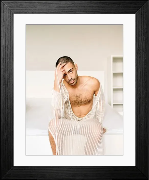 Framed Print : Man, Nude, Transparent dress, Bed, Sitting, View camera Framed Print : Man, Nude, Transparent dress, Bed, Sitting, View camera