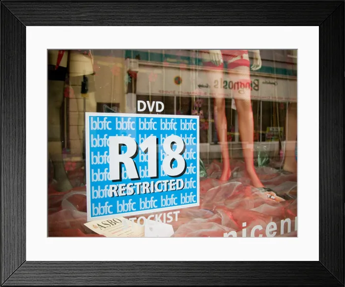 Framed Print : R18 restricted adult video sign in window Nice n Naughty adult sex shop UK Framed Print : R18 restricted adult video sign in window Nice n Naughty adult sex shop UK