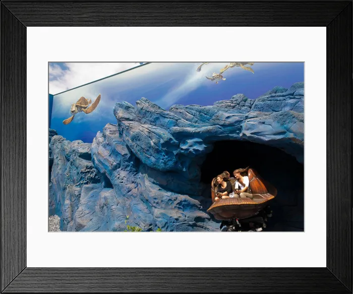 Framed Print : Crush's Coaster ( based on finding Nemo ) roller coaster ride showing movement at Disneyland Paris in France