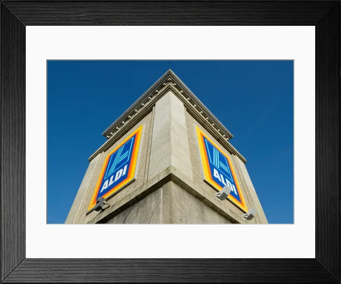 Framed Print : Aldi supermarket shop signs in Camborne, Cornwall UK Framed Print : Aldi supermarket shop signs in Camborne, Cornwall UK
