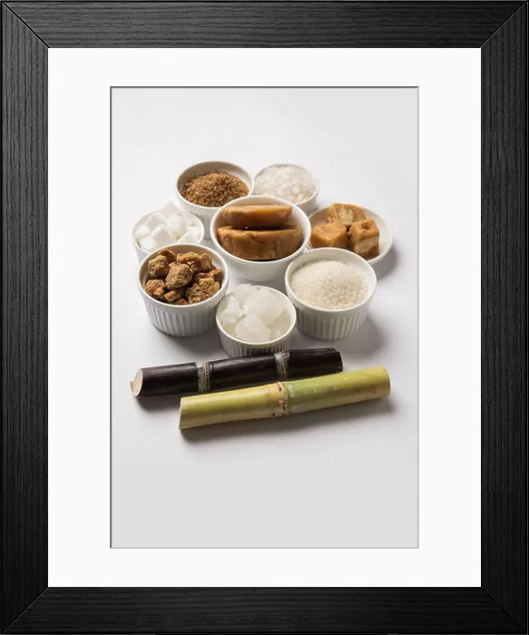 Framed Print : Jaggery, Sugar Variety and Sugarcane - by-products of Sugar Cane or Ganna placed over moody background. Selective focus Framed Print : Jaggery, Sugar Variety and Sugarcane - by-products of Sugar Cane or Ganna placed over moody background. Selective focus