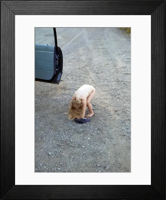 Framed Print : Girl peeing in the road Framed Print : Girl peeing in the road