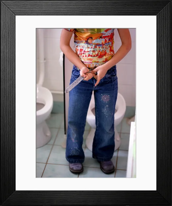 Framed Print : Young girl in the toilets at preschool Framed Print : Young girl in the toilets at preschool