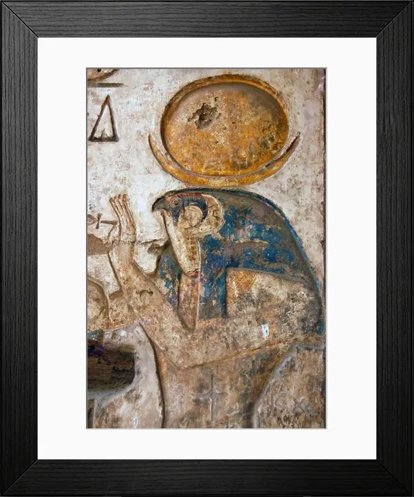 Framed Print : A bas relief sculpture of the falcon headed god Horus holding the sacred ankh in his hand Framed Print : A bas relief sculpture of the falcon headed god Horus holding the sacred ankh in his hand