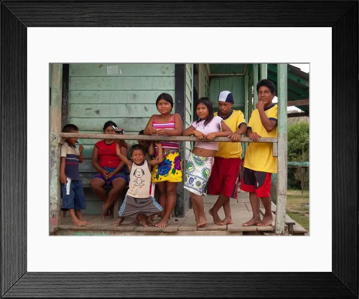 Framed Print : Darien Province, Panama. 07-18-2019. Indigenous family gather at their house in Yaviza in the Darien Province of Panama Framed Print : Darien Province, Panama. 07-18-2019. Indigenous family gather at their house in Yaviza in the Darien Province of Panama