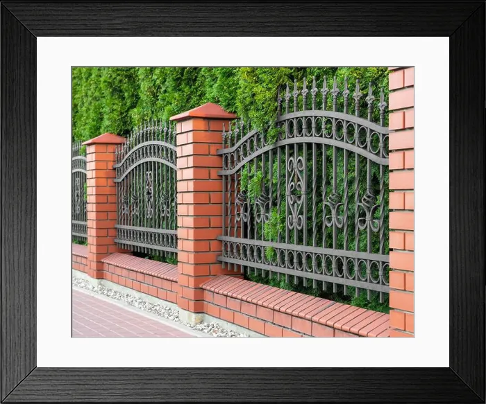 Framed Print : Beautiful brick fence with iron railing outdoors Framed Print : Beautiful brick fence with iron railing outdoors