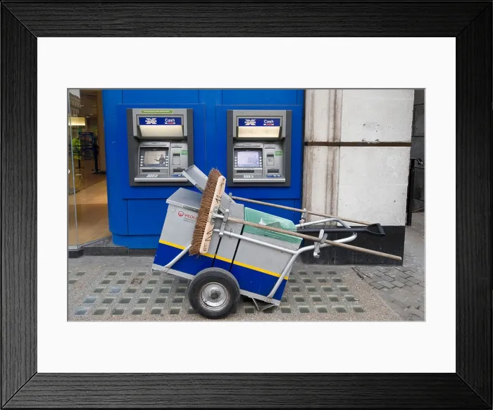 Framed Print : Street cleaner trolley in front of Halifax cash dispensers Framed Print : Street cleaner trolley in front of Halifax cash dispensers