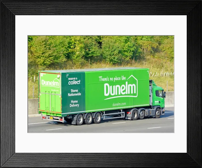 Framed Print : Dunelm lorry and trailer driving along motorway with advertising including reserve & collect facility Framed Print : Dunelm lorry and trailer driving along motorway with advertising including reserve & collect facility