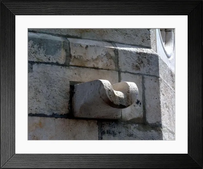 Framed Print : stone scupper drain in historic turret wall in Budapest Framed Print : stone scupper drain in historic turret wall in Budapest
