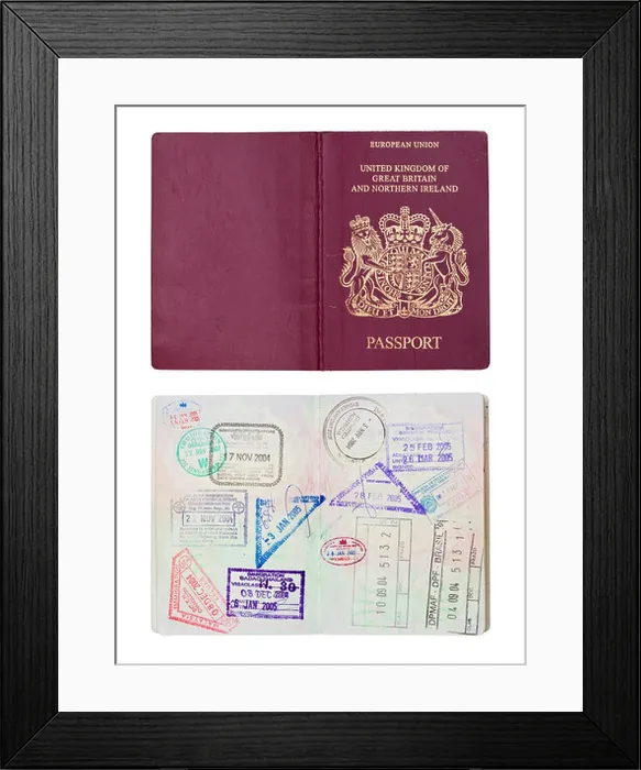 Framed Print : Inside and outside of a well travelled UK Passport, isolated against white with clipping path Framed Print : Inside and outside of a well travelled UK Passport, isolated against white with clipping path