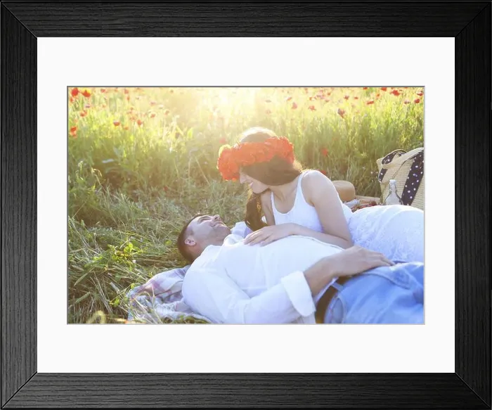 Framed Print : Young couple in love kissing and hugging at poppy field Framed Print : Young couple in love kissing and hugging at poppy field