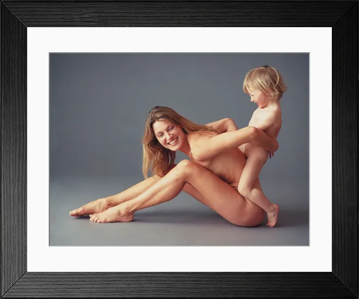 Framed Print : Nude image of mother and infant son playing Framed Print : Nude image of mother and infant son playing