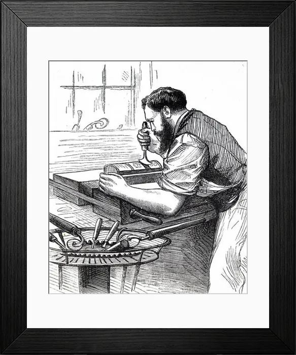 Framed Print : Engraving depicting a process in bookbinding: decorating the spine of a leather-bound book. Dated 19th century Framed Print : Engraving depicting a process in bookbinding: decorating the spine of a leather-bound book. Dated 19th century
