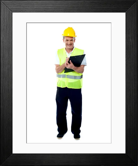Framed Print : Full length portrait of an old age architect holding documents and writing something Framed Print : Full length portrait of an old age architect holding documents and writing something