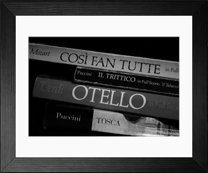 Framed Print : opera musical scores, books stacked, black and white Framed Print : opera musical scores, books stacked, black and white