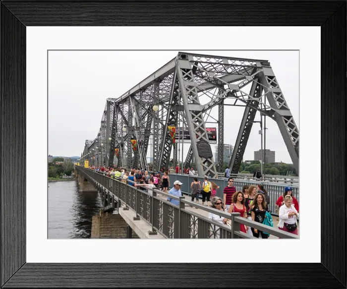 Framed Print : Canada Day Crossing at the Alexandra Bridge. The Alexandra Bridge is turned into a pedestrian bridge for Canada Day Framed Print : Canada Day Crossing at the Alexandra Bridge. The Alexandra Bridge is turned into a pedestrian bridge for Canada Day