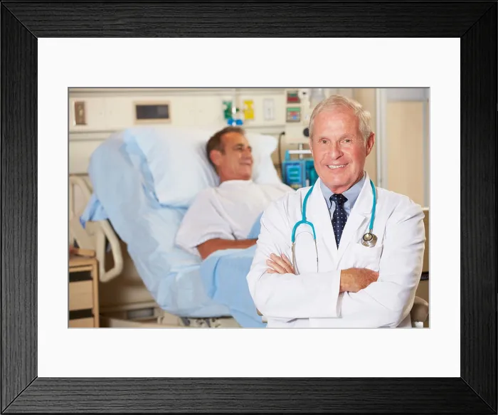 Framed Print : Portrait Of Doctor With Patient In Background