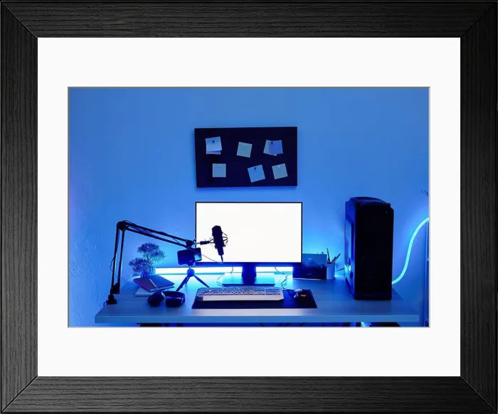 Framed Print : Background image of gaming setup PC on desk lit with blue neon lighting, screen mockup Framed Print : Background image of gaming setup PC on desk lit with blue neon lighting, screen mockup