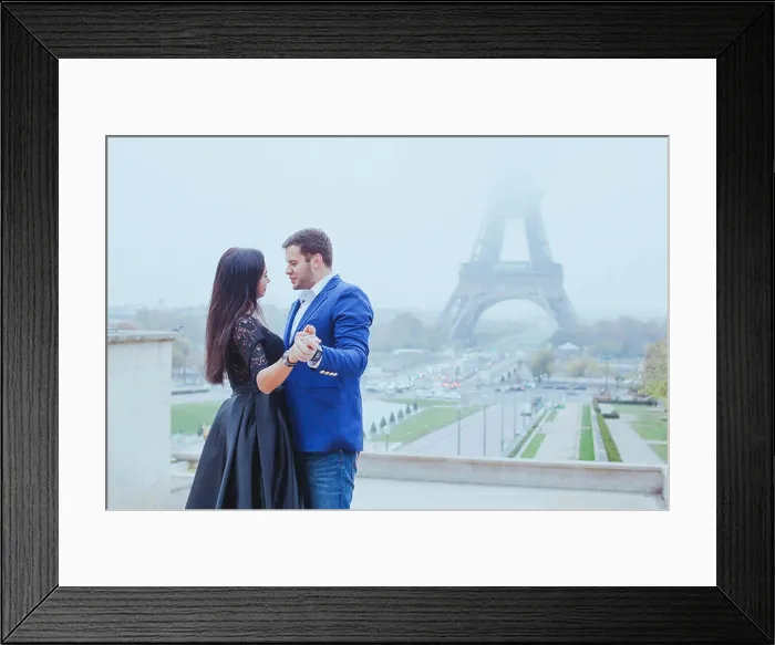 Framed Print : romantic moment near Eiffel tower, portrait of couple in love Framed Print : romantic moment near Eiffel tower, portrait of couple in love