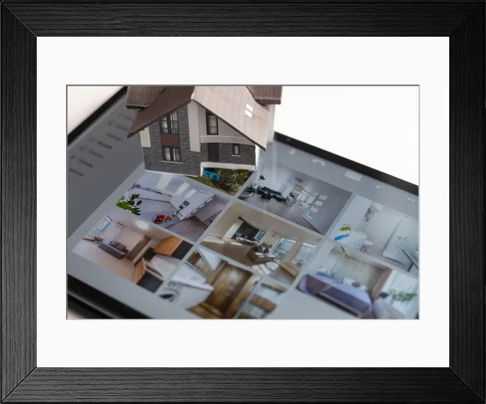 Framed Print : Small house model is on screen tablet and icons home electronics devices connecting with wireless Framed Print : Small house model is on screen tablet and icons home electronics devices connecting with wireless
