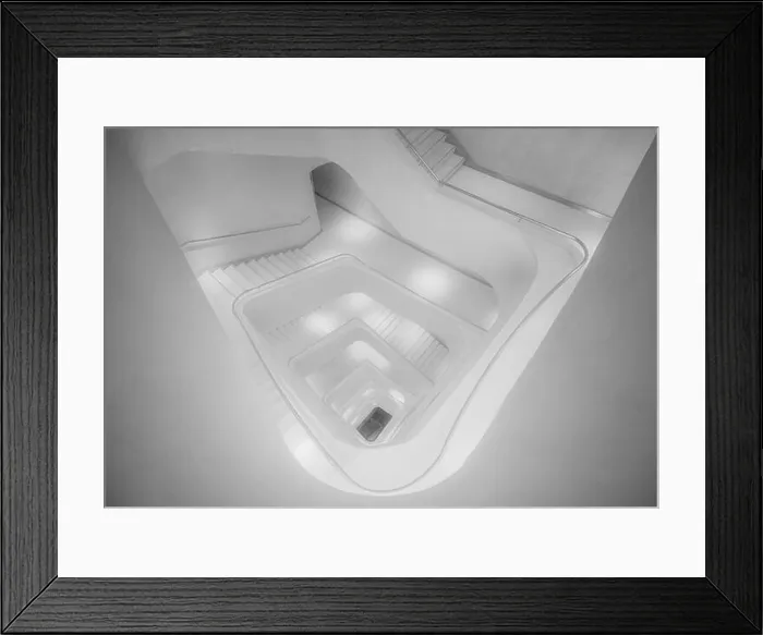 Framed Print : From above of perspective contemporary illuminated stairway in white color going spiral Framed Print : From above of perspective contemporary illuminated stairway in white color going spiral