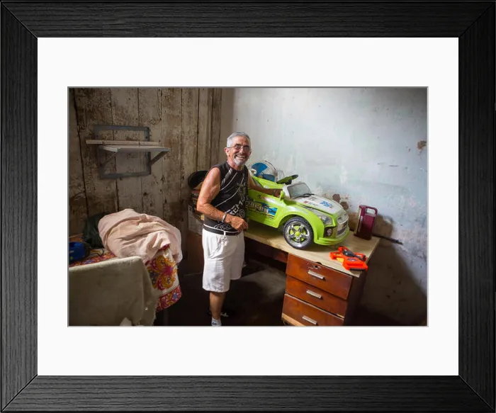 Framed Print : Portrait of transgender man Juani Santos (64) at home in his hometown Matanzas Framed Print : Portrait of transgender man Juani Santos (64) at home in his hometown Matanzas