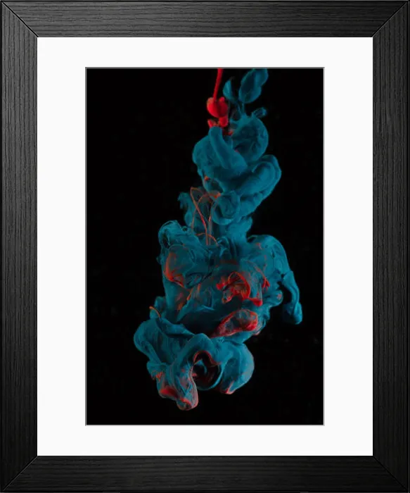 Framed Print : Blue and Red ink falling into water and mixing as it falls Framed Print : Blue and Red ink falling into water and mixing as it falls