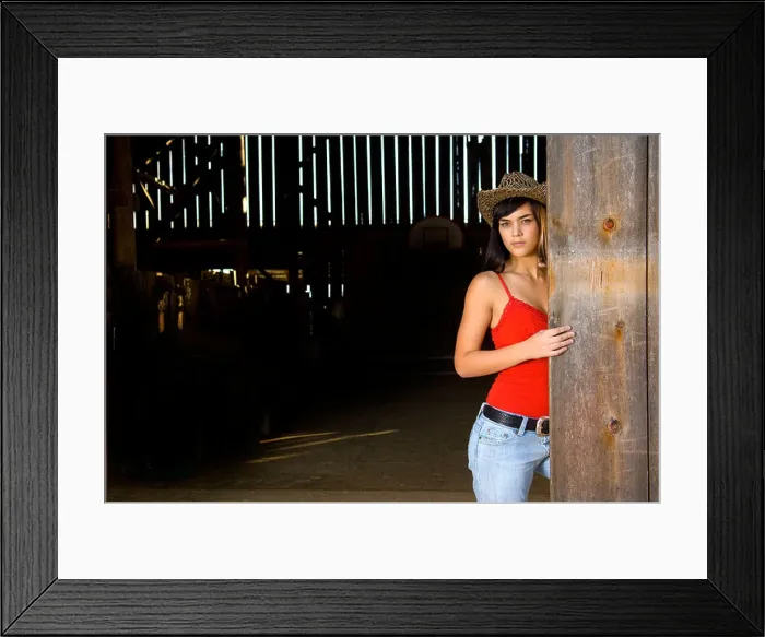 Framed Print : Cowgirl in barn doorway with hat and tank top Framed Print : Cowgirl in barn doorway with hat and tank top