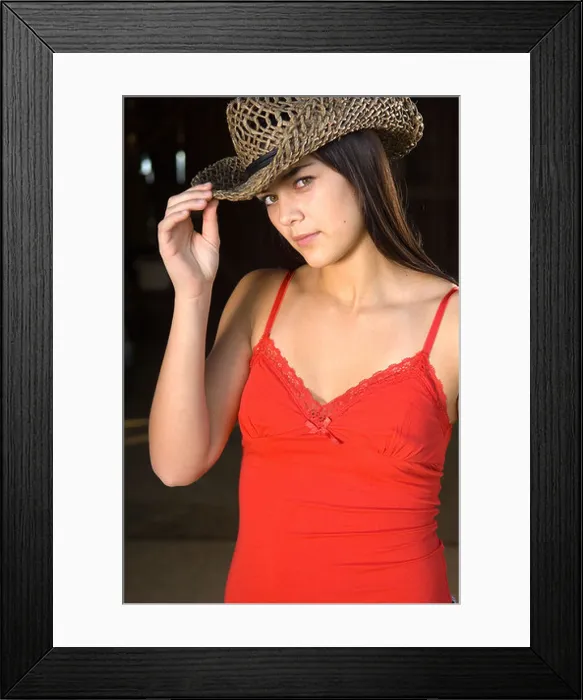 Framed Print : Cowgirl in barn doorway with hat and tank top Framed Print : Cowgirl in barn doorway with hat and tank top
