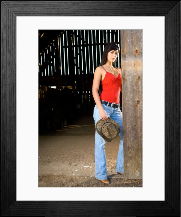 Framed Print : Cowgirl in barn doorway with hat and tank top Framed Print : Cowgirl in barn doorway with hat and tank top