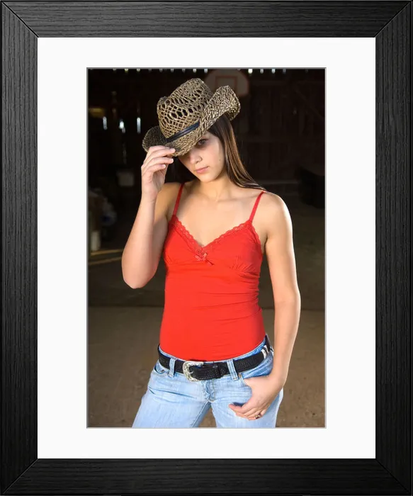 Framed Print : Cowgirl in barn doorway with hat and tank top Framed Print : Cowgirl in barn doorway with hat and tank top