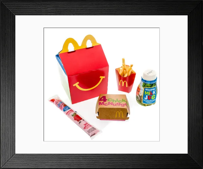 Framed Print : Winneconne, WI - 7 August 2018: A Chicken McNuggets happy meal with white milk and yogurt on an isolated background Framed Print : Winneconne, WI - 7 August 2018: A Chicken McNuggets happy meal with white milk and yogurt on an isolated background
