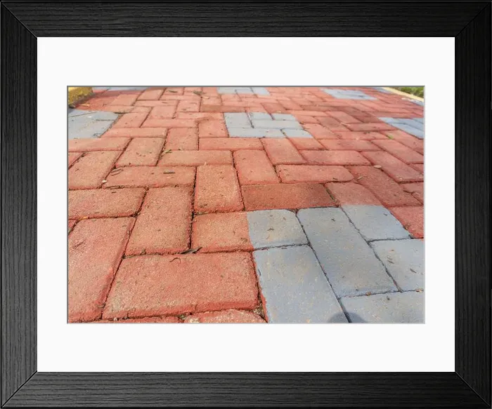 Framed Print : Orange colored paving block bricks path in the park close up Framed Print : Orange colored paving block bricks path in the park close up