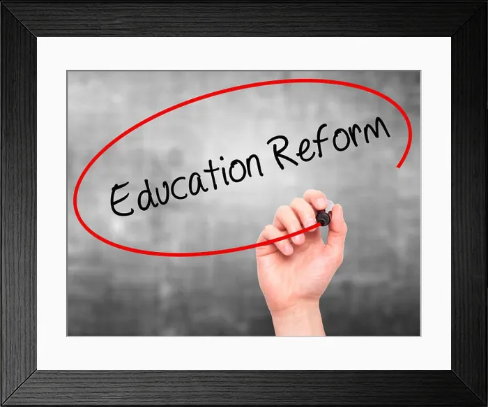 Framed Print : Man Hand writing Education Reform with black marker on visual screen Framed Print : Man Hand writing Education Reform with black marker on visual screen